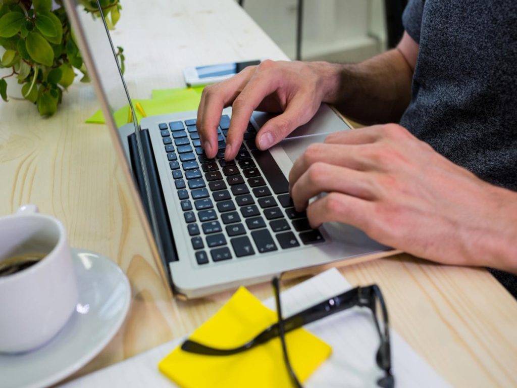 A man using best laptop for business