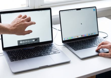 Comparison of touchscreen and traditional MacBook Pro laptop displays