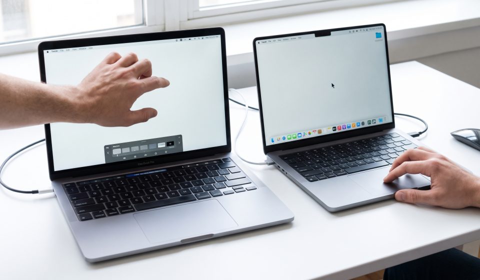 Comparison of touchscreen and traditional MacBook Pro laptop displays